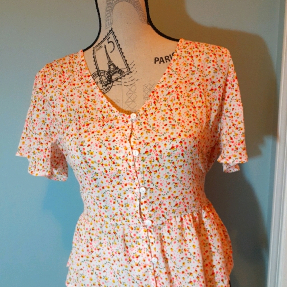 Button front floral blouse.